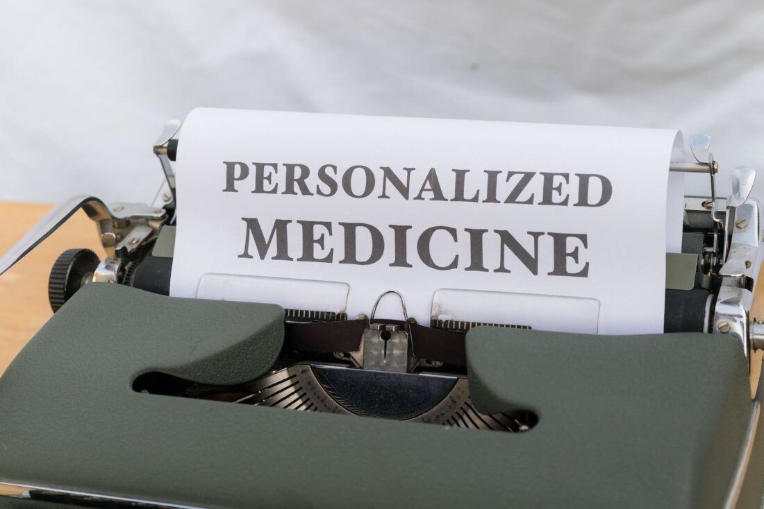 a typewriter with personalized medicine written on it